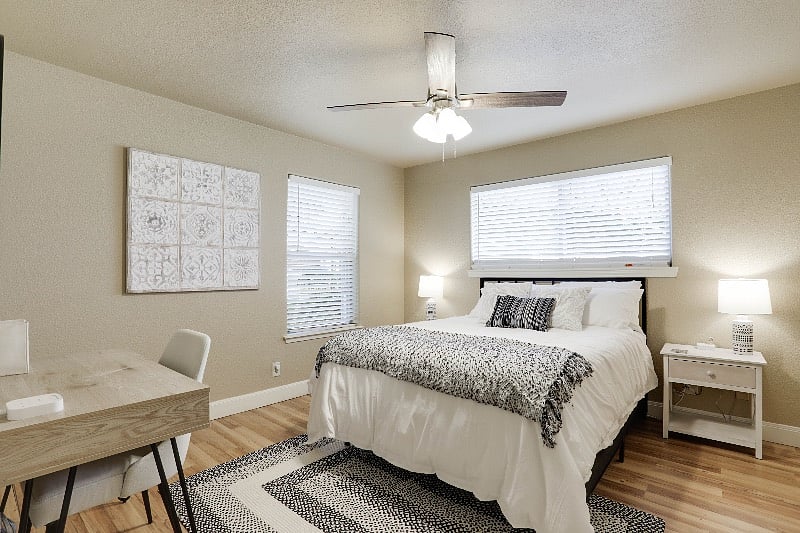 Queen Bedroom #1 | Modern vibe with private workstation and dedicated wi-fi makes a work-from-home day a breeze!