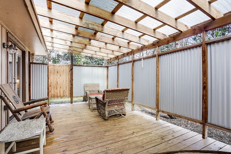 Covered, outdoor patio for lounging, reading or a cup of coffee as the sun rises. Accessible from the Master Ensuite and Living Area.