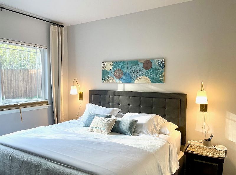 Very comfortable king-size bed with black out shades and curtains.