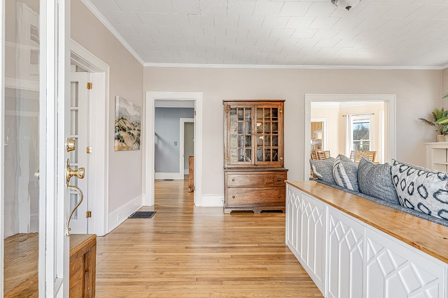 Enter through the living room.