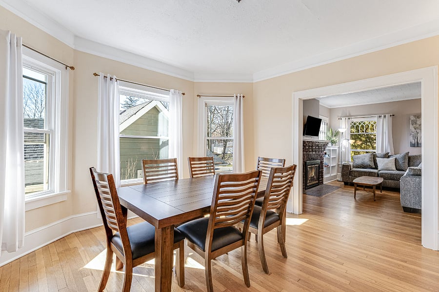 Sunny dining room with light-filtering curtains