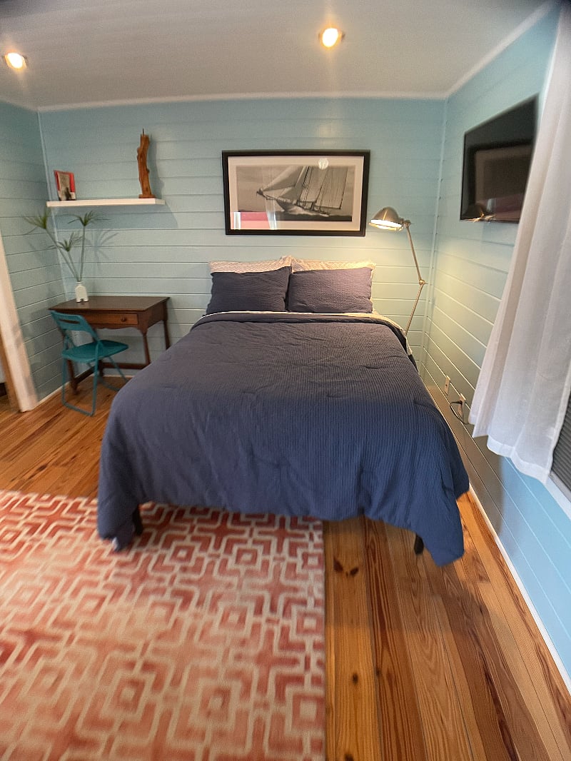 Full size bed with foam pillow topper makes for a comfy night's sleep. Desk and chair too.