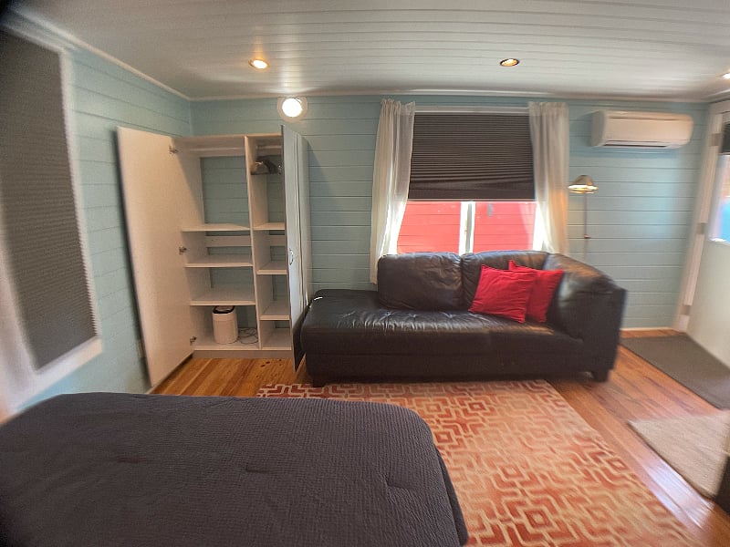 The wardrobe has ample storage for your belongings.