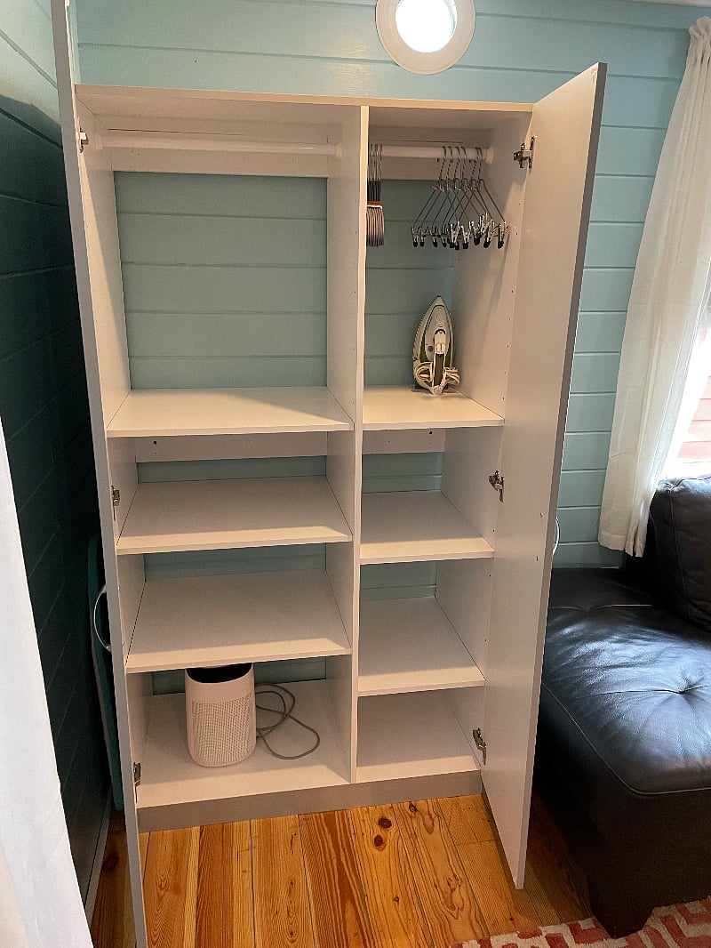 The wardrobe has ample storage for your belongings.
