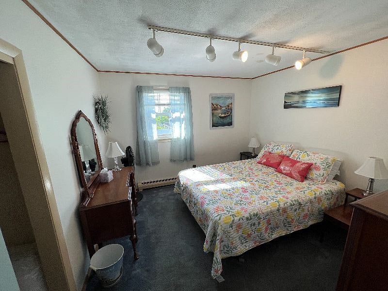 Queen bed with a closet