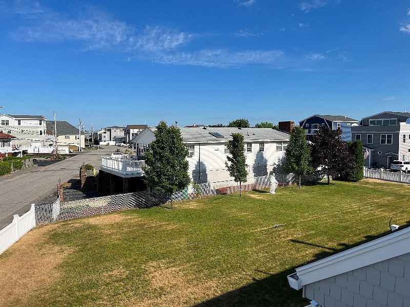 View from lawn on upstairs patio
