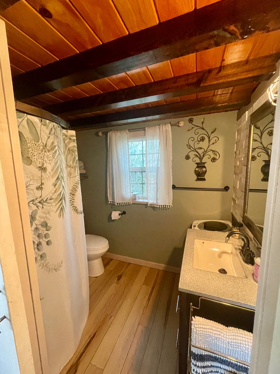 Updated bathroom with compact clothes washer! 