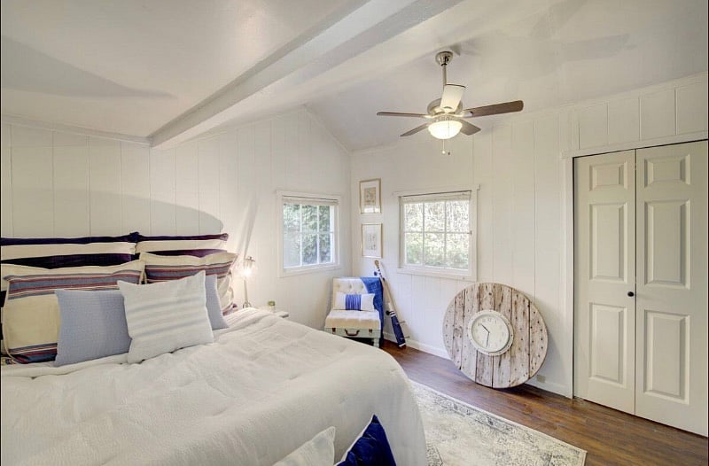 Bedroom with a queen size bed and perfect amount of storage!