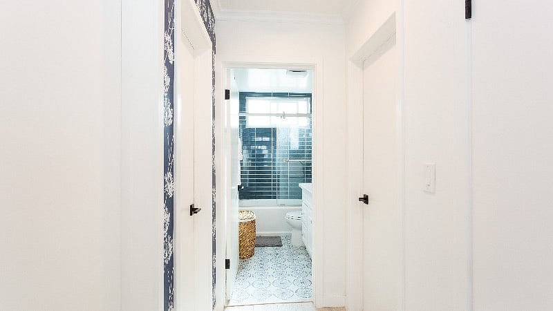 Hallway leading to guest bathroom