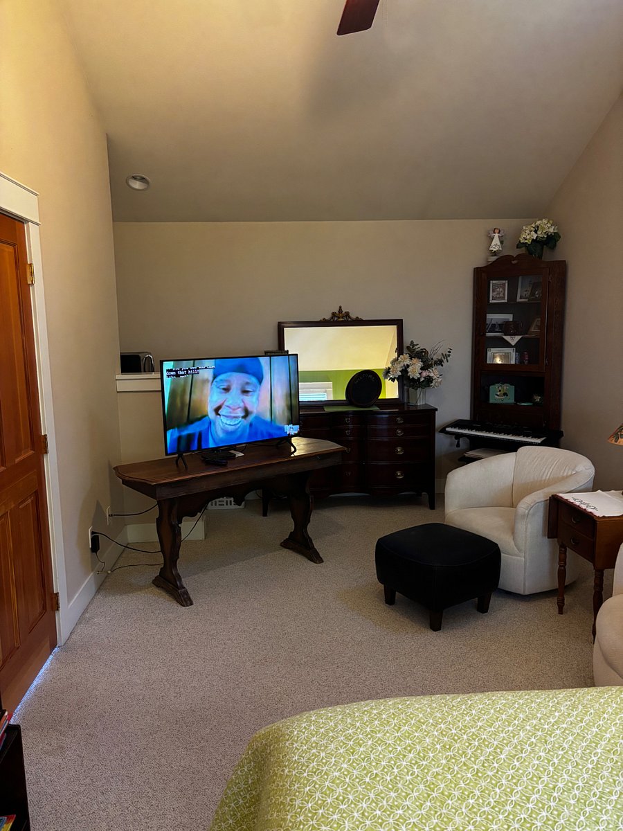 Large television - suite also includes a mini-fridge and microwave.