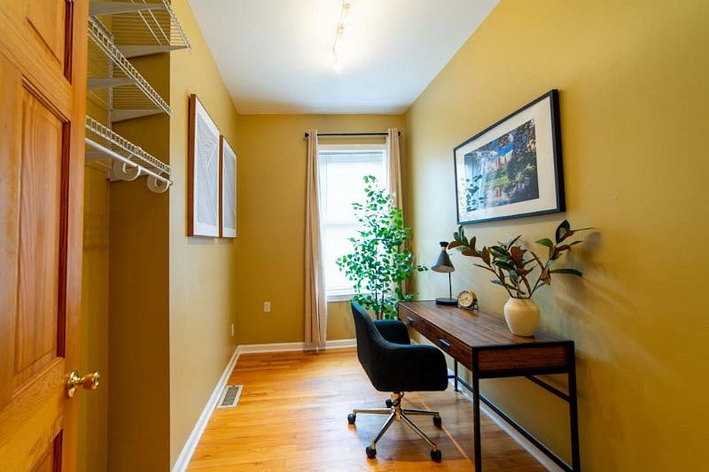 Quiet office space with unique lamp that charges all types of phones no USB needed.