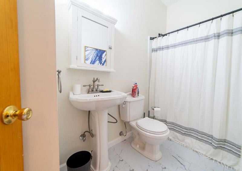 The second bathroom located next to the second bedroom.