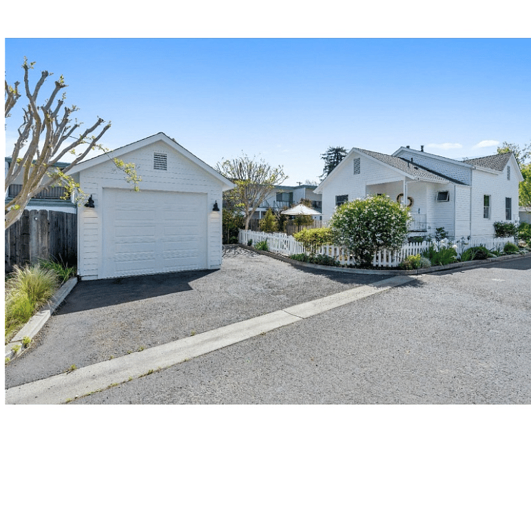 Single car garage with additional single open parking space