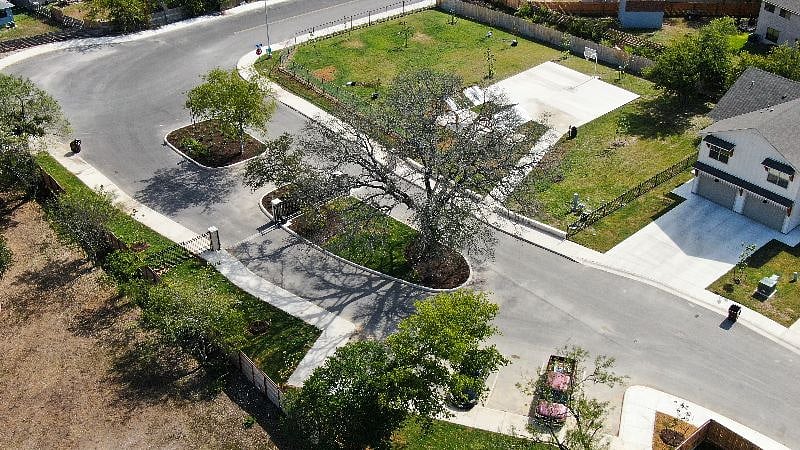 Back Gate and Basketball Court