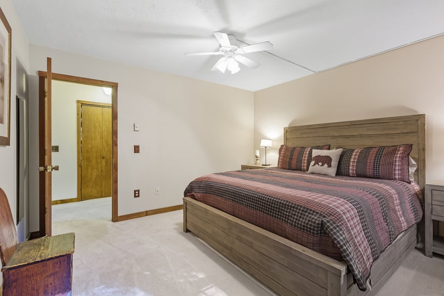 King bed on main level next to bathroom