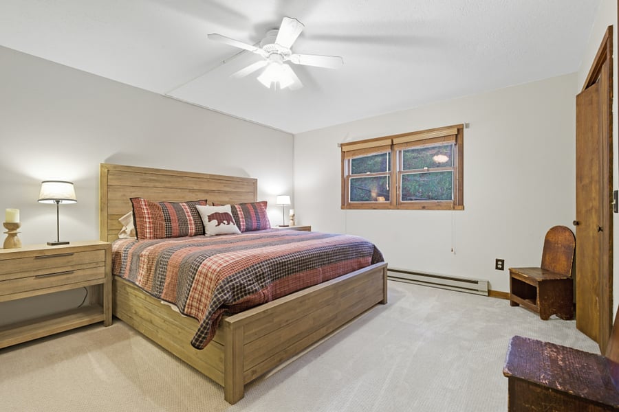 King bed on main level next to bath