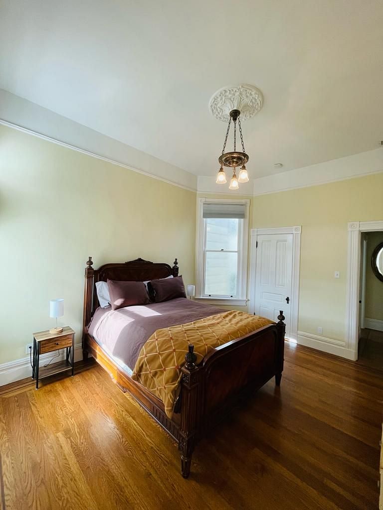 Bedroom with queen size bed.