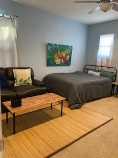 QUEEN SIZED BED, SMALL SOFA AND COFFEE TABLE