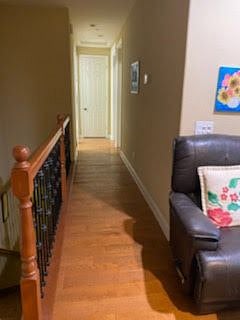 Hallway leading to the private bedroom with private bath.