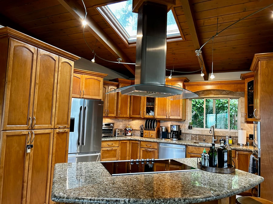 Fully stocked kitchen with Bosch refrigerator and dishwasher. All the dishes, utensils, cookware and amenities you could ever need.