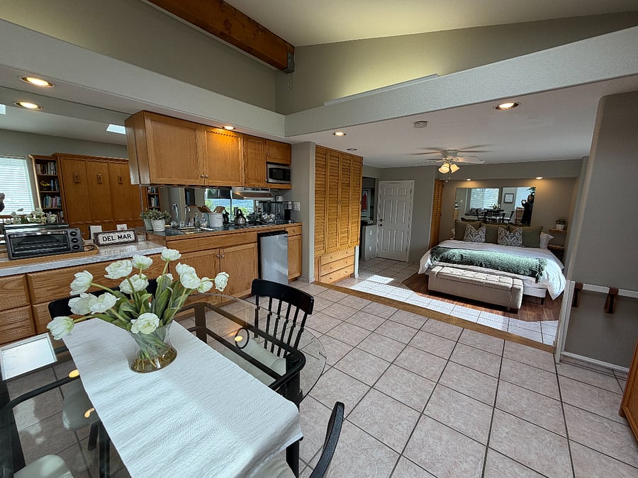 Master bedroom suite with king size bed, a full size Murphy bed and kitchenette. Entry to this room from inside the house and also has a separate entrance from the outside.