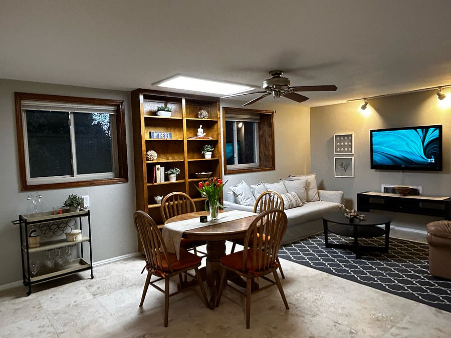Dining table and built-in bookcase in the living/dining room.