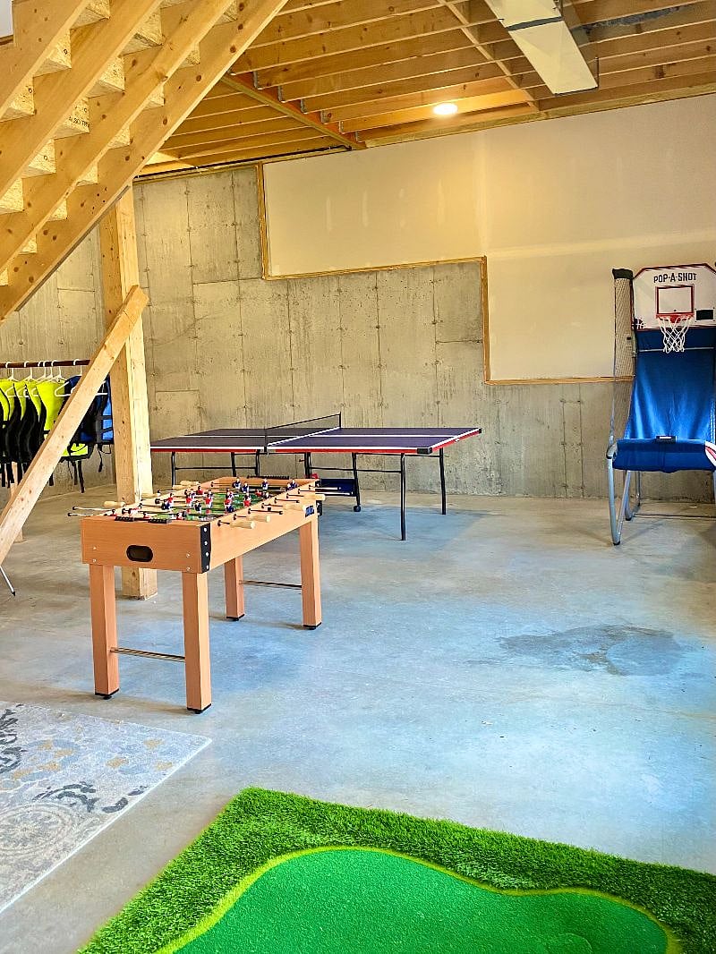 Walk out basement with games and full washer and dryer.
