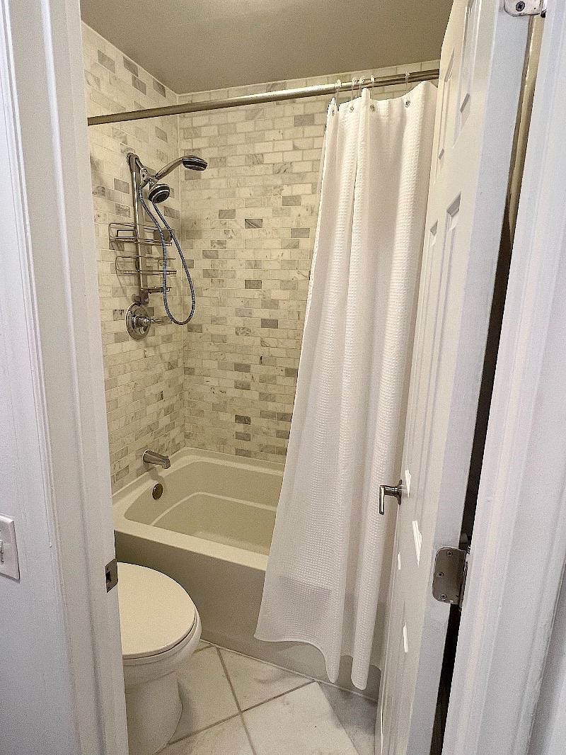 Master bath: custom tiled shower and dual nozzle shower head - you will not want to leave!