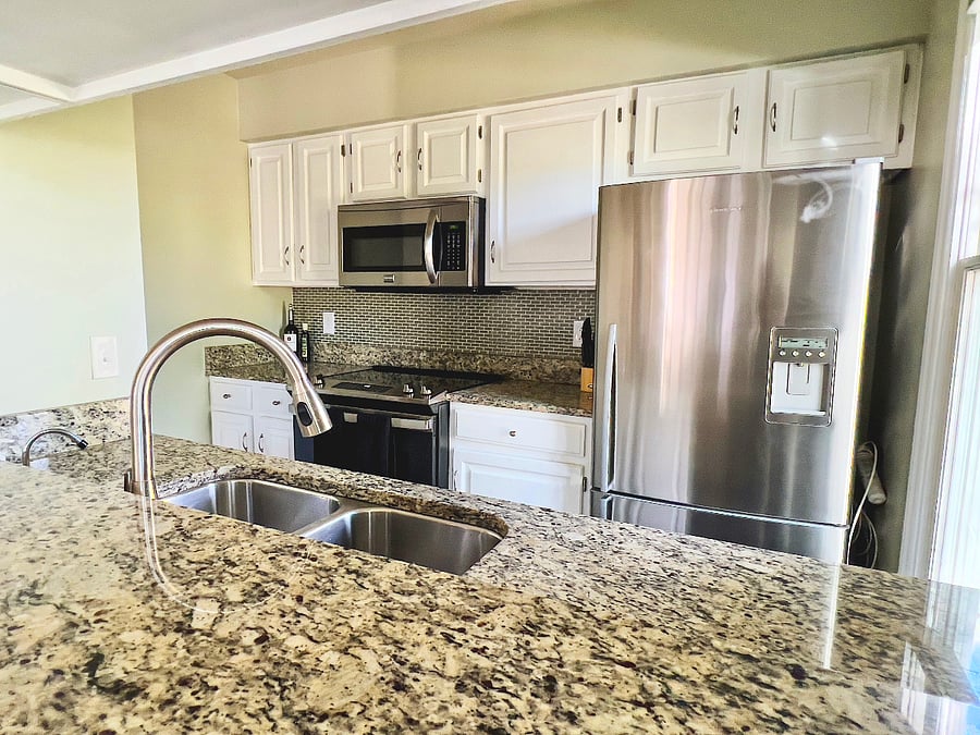 The kitchen: one of the nicest we have found (in our opinion!). Complete with all stainless steel appliances, granite countertops, and a custom tiled backsplash.
