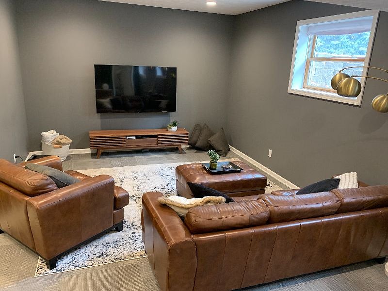 Suite Adeline - lower level living room with 3 daylight windows