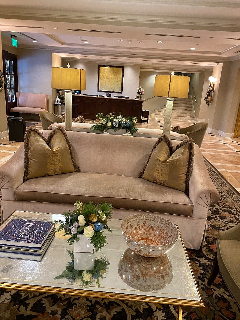 Building lobby; concierge desk. Mailroom behind.