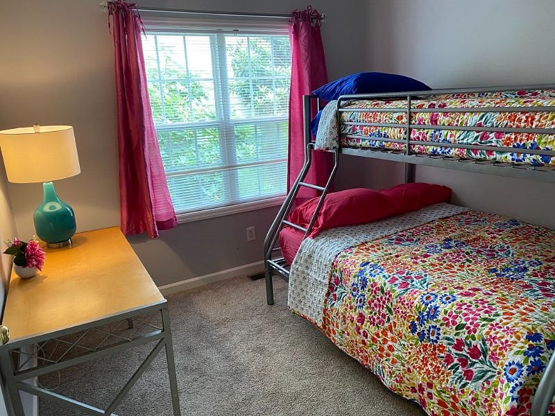 The 3rds bedroom has a bunk bed with a single on top and a full down below. There is also a desk work station in this room.