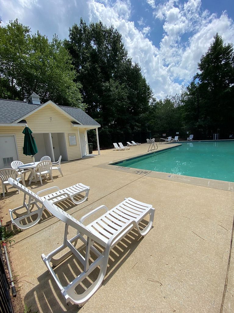 The community pool is right down the street from the house.