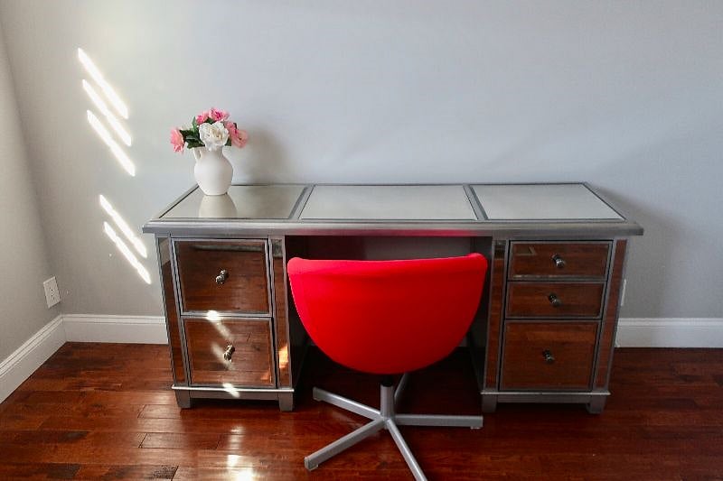 Desk for your work from home needs in back bedroom. Monitor available.