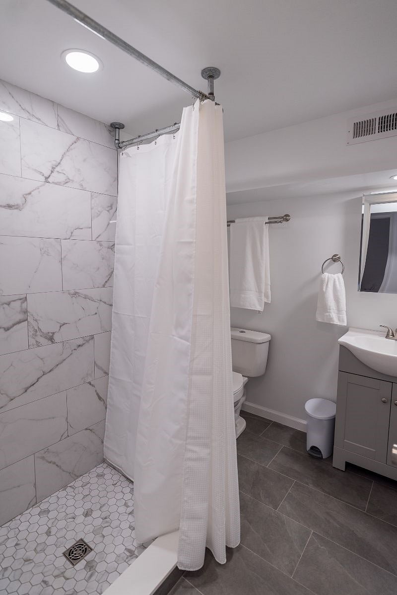 This bright and beautifully-tiled bathroom is eco-friendly! Plus, shower gel, shampoo and conditioner is included so you don't need to worry about bringing your own, or buying those wasteful 3-oz containers.