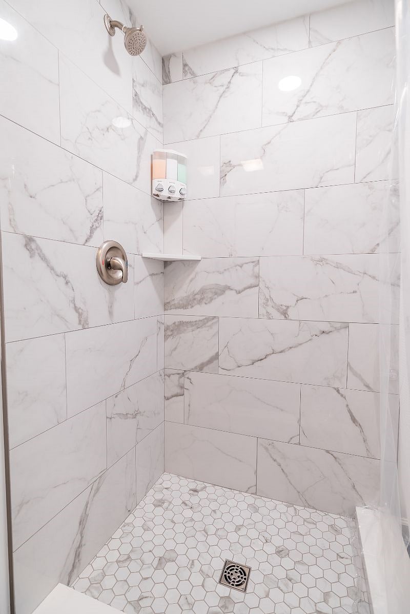 This bright and beautifully-tiled bathroom is eco-friendly! Plus, shower gel, shampoo and conditioner is included so you don't need to worry about bringing your own, or buying those wasteful 3-oz containers.