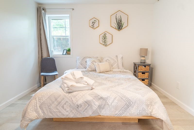 Both bedrooms have a comfy queen foam mattress, two bedside tables with reading lamps, a dresser/wardrobe and a closet for your clothes. A ceiling fan with adjustable speed and brightness, as well as room-darkening curtains and white noise machine should help you sleep easy, even during the day.