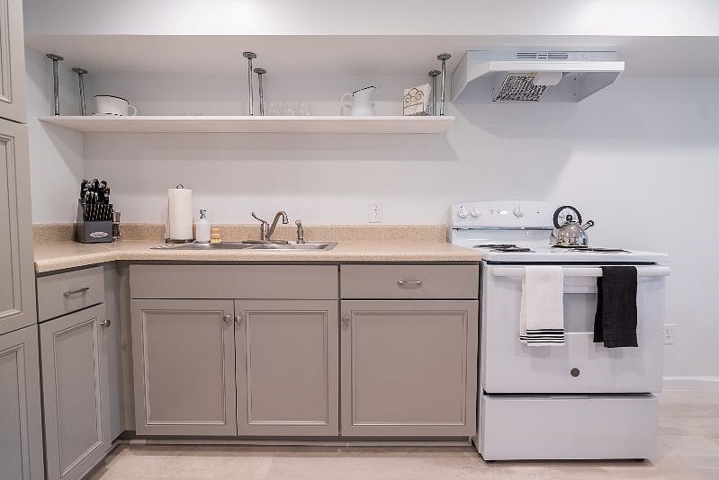 This full kitchen features everything you need. Full fridge, oven/range, microwave, coffee-maker, pots and pans, baking sheets, crockpot, and a kettle. Plus, glassware, flatware, plates and wine glasses for 6! Not to mention plenty of storage.