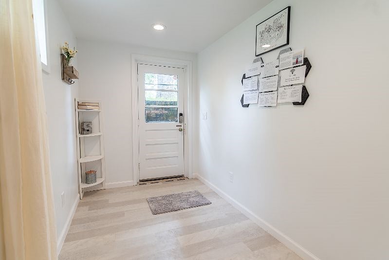 The bright entryway is the perfect welcome to the apartment. It features plenty of space to hang your coat, drop your bags, and relax in your new home! Plus our welcome wall has everything you need to know and all our favorite local tips!