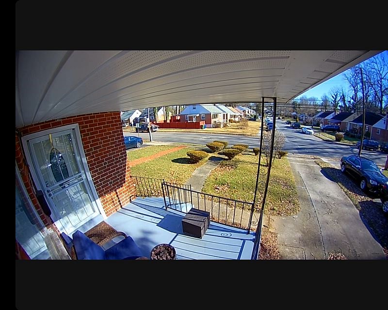 Front of the house and car port on the side of the house-front porch ring camera view