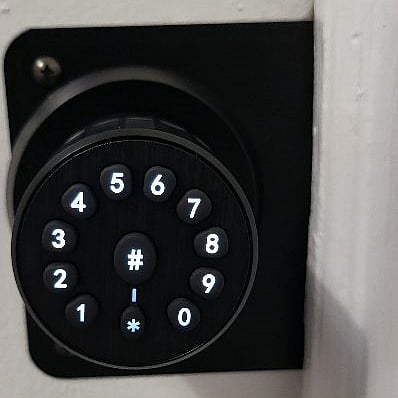 Each bedroom has there own keyless door knob and code