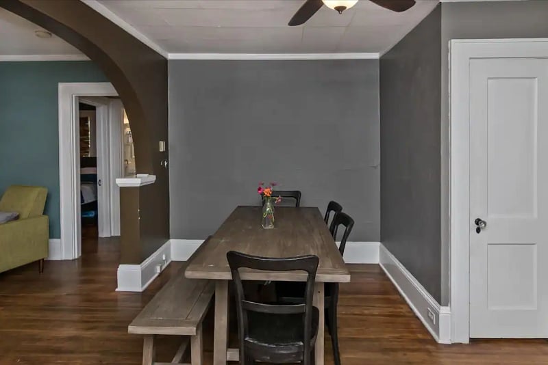 Gather around the table and enjoy a meal together.