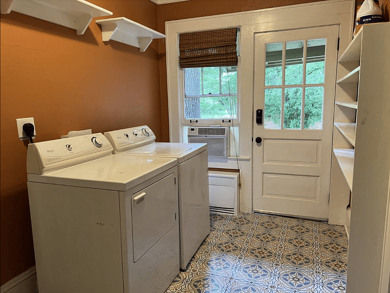 Laundry room is conveniently located near the primary bedroom.