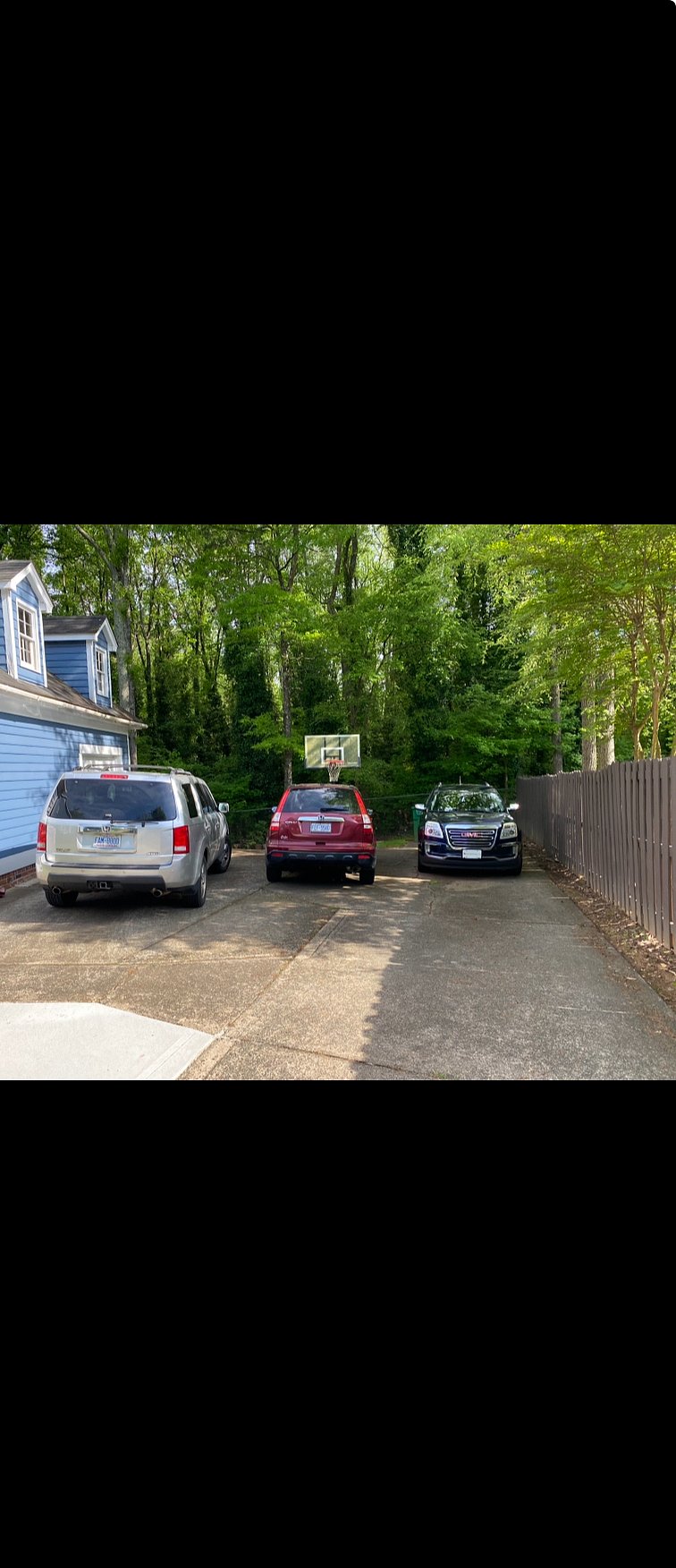 Tenant parking next to fence