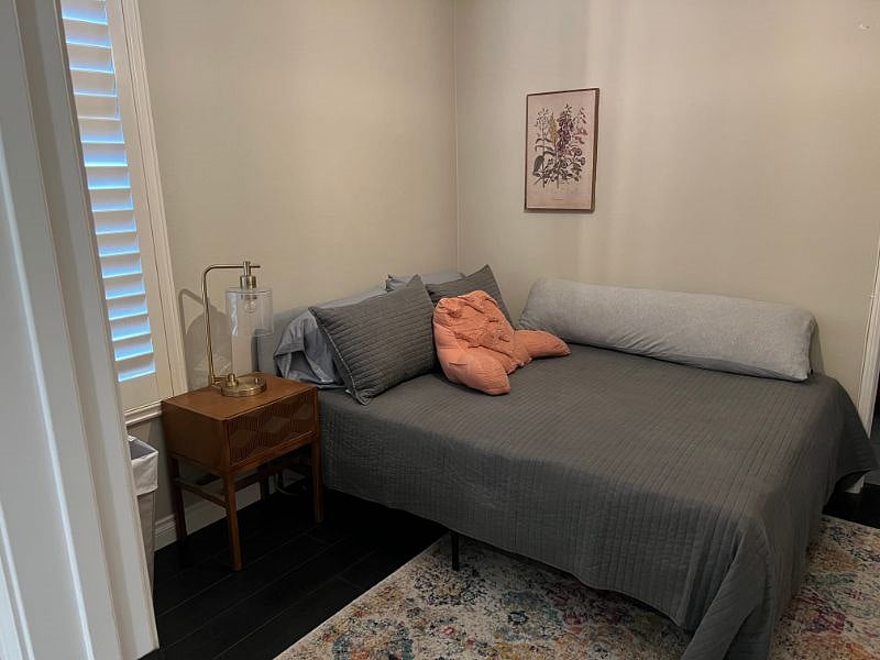 Secondary bedroom is a Queen with a small night stand