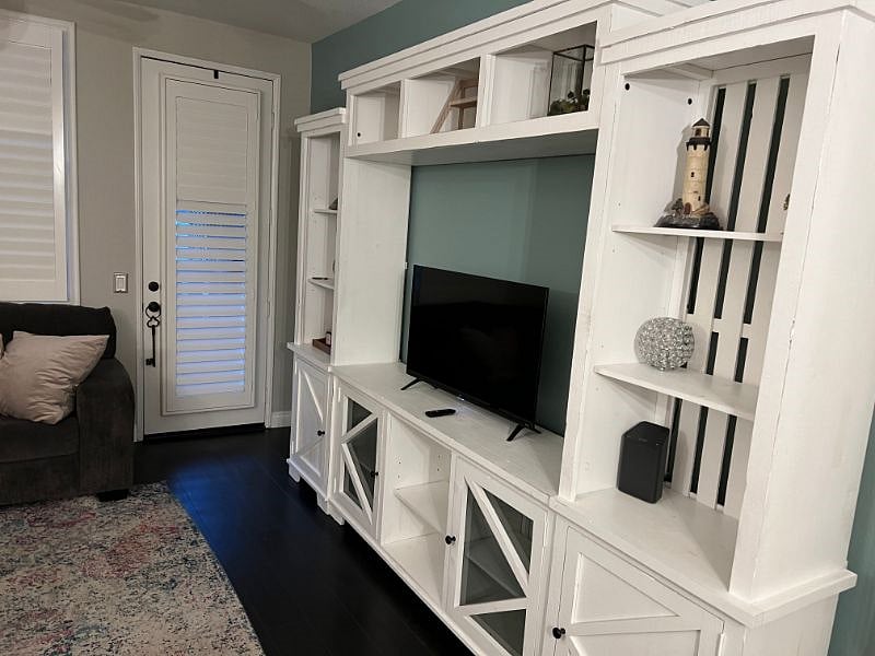 TV area with lots of room for collectibles and memorabilia