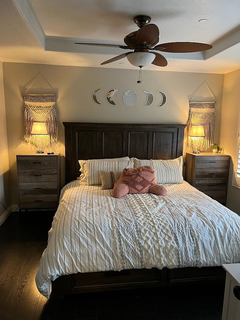 King-size bed in the Primary Bedroom with two nightstands and drawers in the bed frame