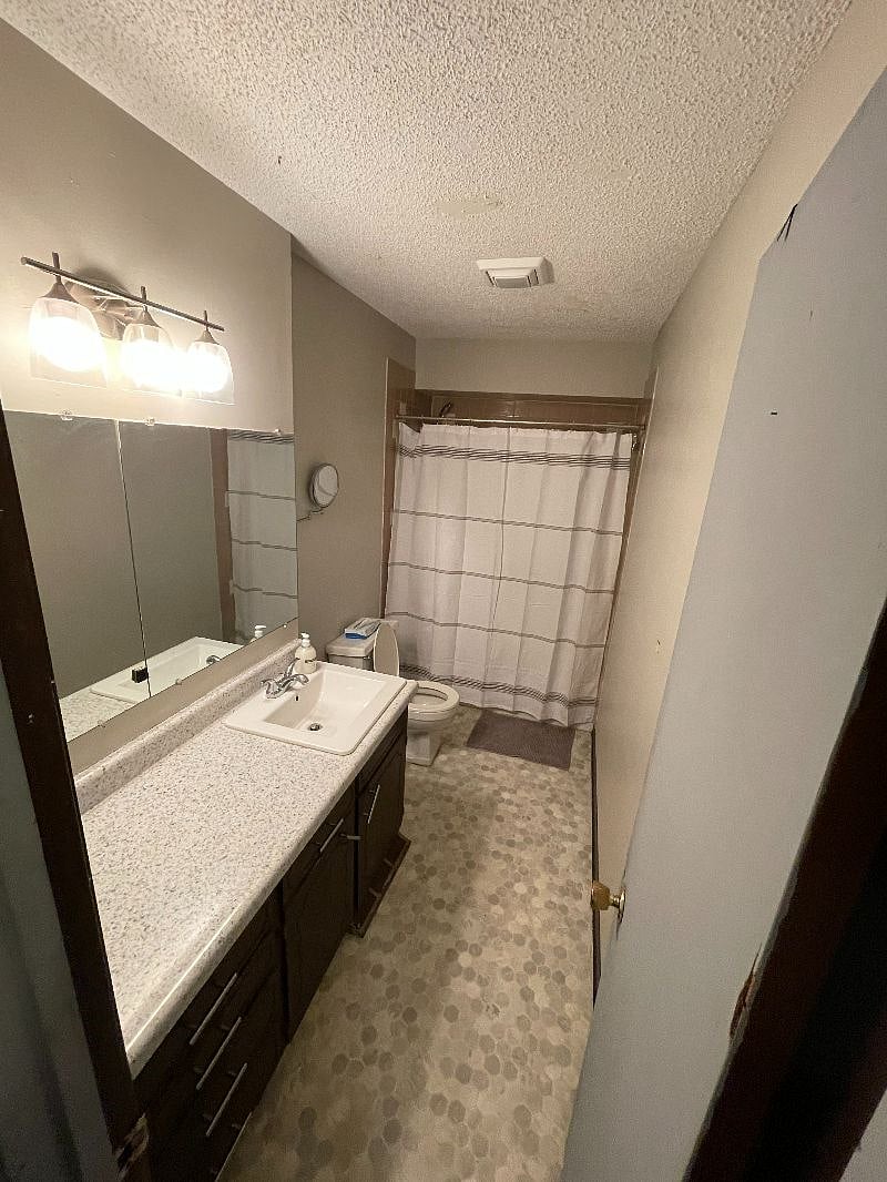 1213 Bathroom - Brand New Countertops, Sink, and Toilet