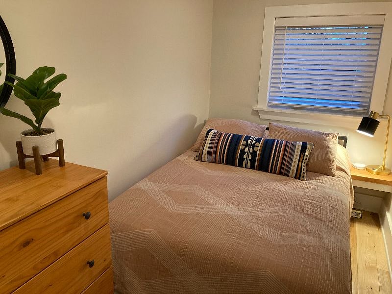 Full size bed with built in nightstand