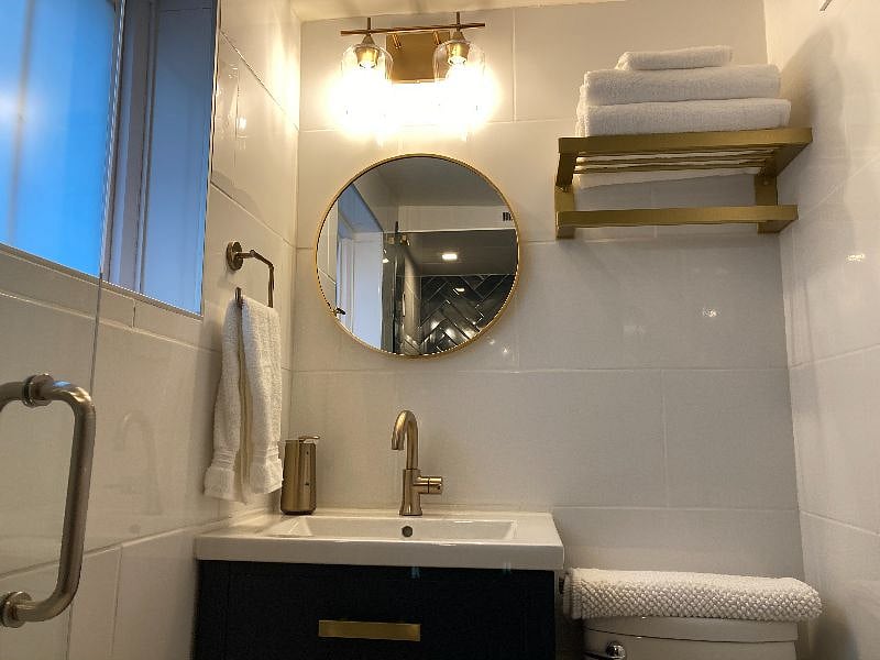 Towel rack above toilet